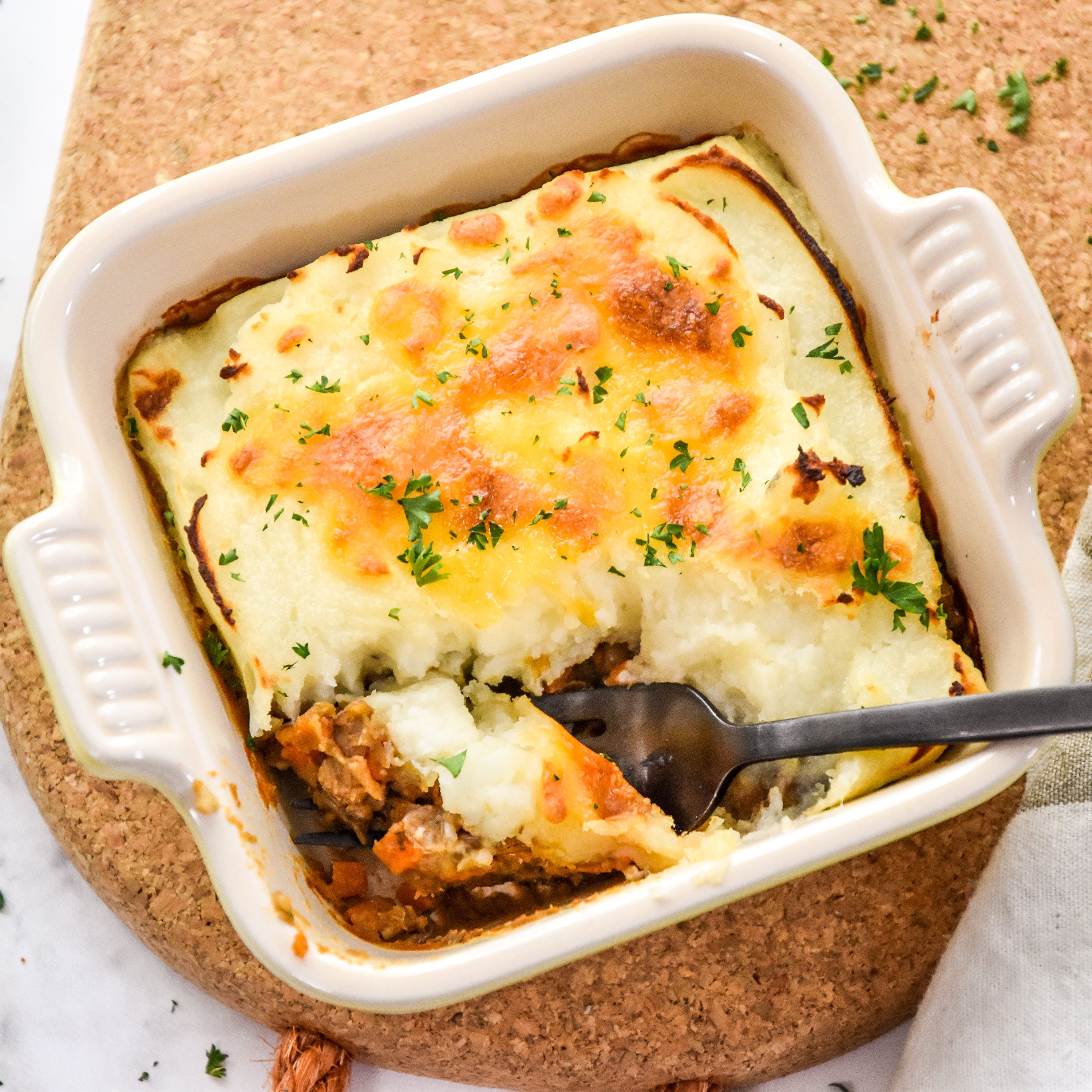 image of vegetarian shepherd's pie baked in an individual dish